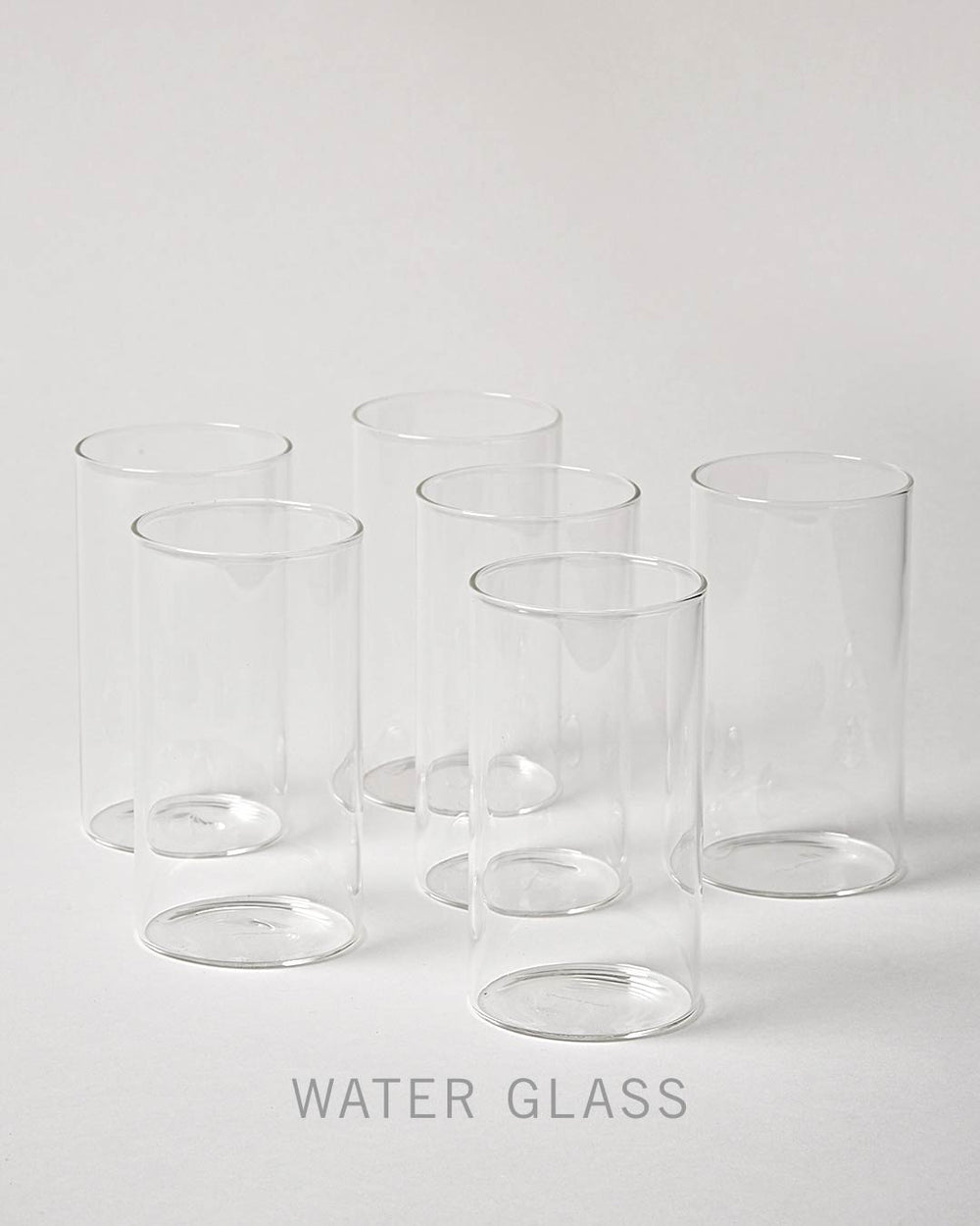 https://www.farmhousepottery.com/cdn/shop/files/GLA09_Water_Glass_Product_Image_Studio_Vertical.jpg?v=1703624487&width=1000